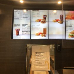 McDonald's - limited menu and plexiglass barriers during the pandemic.