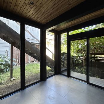 Rivolty - Floor-to-ceiling glass, slat wood paneling, and radiant heat flooring - Sheds & Outdoor Storage Near Me Rivolty - Floor-to-ceiling glass, slat wood paneling, and radiant heat flooring - Sheds & Outdoor Storage Near Me