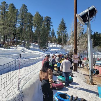 Ruidoso Winter Park - You can't even see the conveyor in this photo because the line is so long. - Tubing Near Me - Alto, New Mexico
