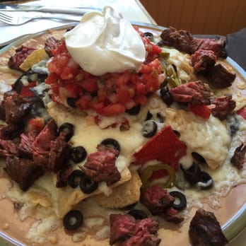 Gypsy Cafe - Gigantic nachos with steak (med rare) - New American Near Me - Lincoln, New Hampshire