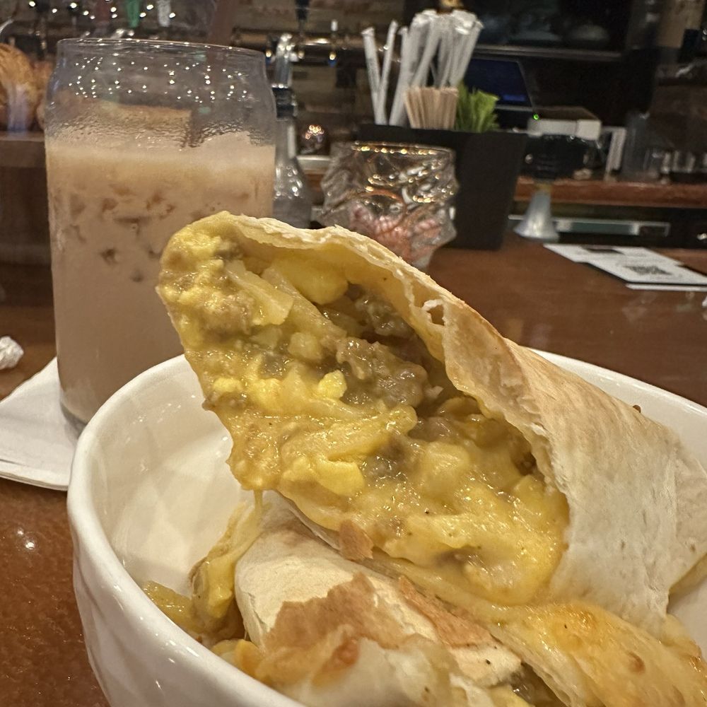 Cloud Parlor Speakeasy Cafe - Iced dirty chai latte & turkey sausage breakfast burrito. - Coffee & Tea Near Me - Cocoa Beach, Florida