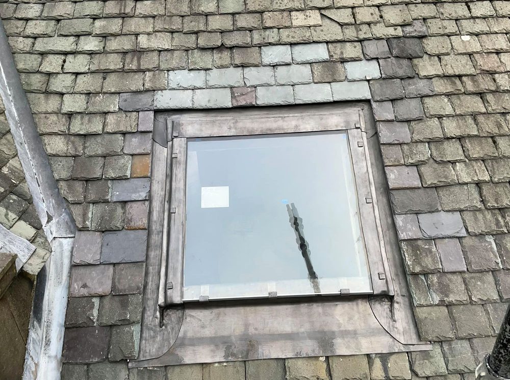 Slide of Quail Hill Roofing