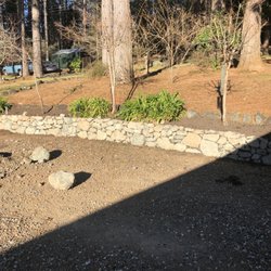 ABC Masonry - Love our stacked rock retaining wall