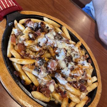 Antonio’s Mexican Restaurant - Antonio's cheese fries - with cheese, bacon and chorizo - Mexican Near Me - Terre Haute, Indiana