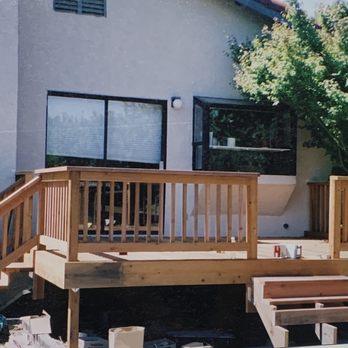 Valley Landscaping - a deck with stairs and railings - Landscaping Near Me Valley Landscaping - a deck with stairs and railings - Landscaping Near Me