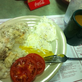 Doe Doe's Diner - Half a biscuit gravy, eggs over easy, tomatoes, and a cup of joe. - Breakfast & Brunch Near Me - Saint Petersburg, Florida Doe Doe's Diner - Half a biscuit gravy, eggs over easy, tomatoes, and a cup of joe. - Breakfast & Brunch Near Me - Saint Petersburg, Florida