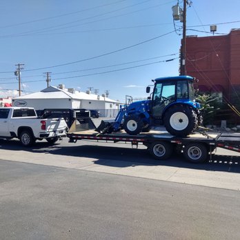 Feed World - LS Tractor hauled by an Iron Bull Trailer! Great combination of durability and versatility. - Trailer Dealers Near Me - Reno, Nevada Feed World - LS Tractor hauled by an Iron Bull Trailer! Great combination of durability and versatility. - Trailer Dealers Near Me - Reno, Nevada