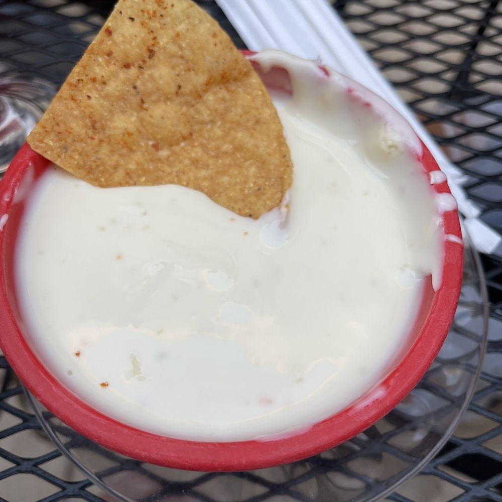 The 3 Amigos Mexican Restaurant - Cheese Dip Thick Queso with seasoned chips. Delicious! - Mexican Near Me - Bloomington, Indiana The 3 Amigos Mexican Restaurant - Cheese Dip Thick Queso with seasoned chips. Delicious! - Mexican Near Me - Bloomington, Indiana