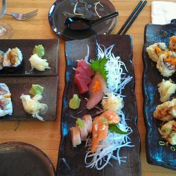 Geisha - Tuna, bass, albacore, and salmon sashimi in the center. Beautiful plateware! - Japanese Near Me - Capitola, California