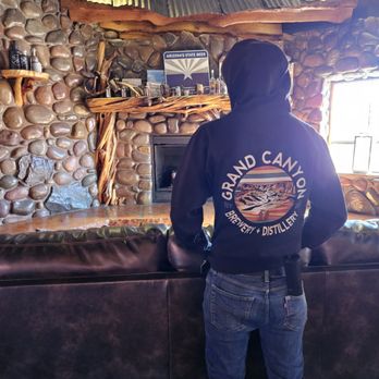 Grand Canyon Brewing + Distillery - One of the staff, while at work, still successfully models a hoodie - 10.25.2025 - American Near Me - Williams, Arizona