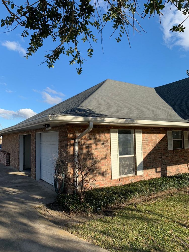 Slide of Pelican Roofing Company