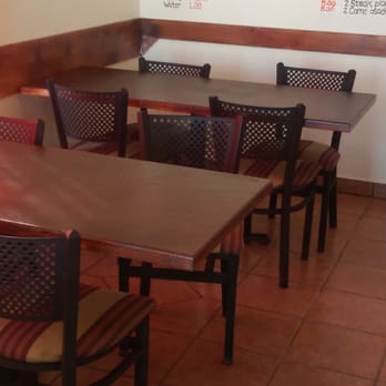 Irma's Kitchen - Dining room is simple, clean and pleasant.  Curtained windows and a touch or two of simple décor and small size make it warm. - Breakfast & Brunch Near Me - Phoenix, Arizona