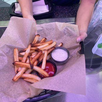 Chuck E. Cheese - According to the cook these aren't burned and are just "like that" - Pizza Near Me - Stevenson Ranch, California