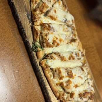 Trail Boss Steak & Grill - Alfredo flatbread. - Steakhouses Near Me - Bandera, Texas Trail Boss Steak & Grill - Alfredo flatbread. - Steakhouses Near Me - Bandera, Texas