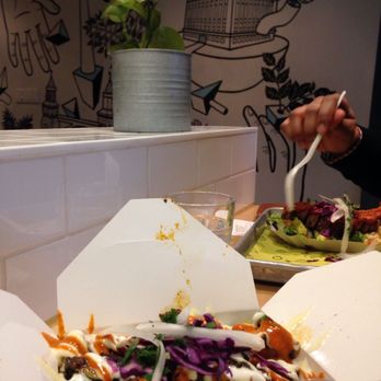 Otto's Berlin Döner - Gemuse (vegetarian) doner teller, (with currywurst in the background) - German Near Me - Toronto, Ontario Otto's Berlin Döner - Gemuse (vegetarian) doner teller, (with currywurst in the background) - German Near Me - Toronto, Ontario