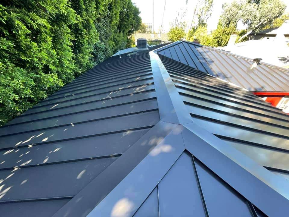 Slide of Green Shield Roofing