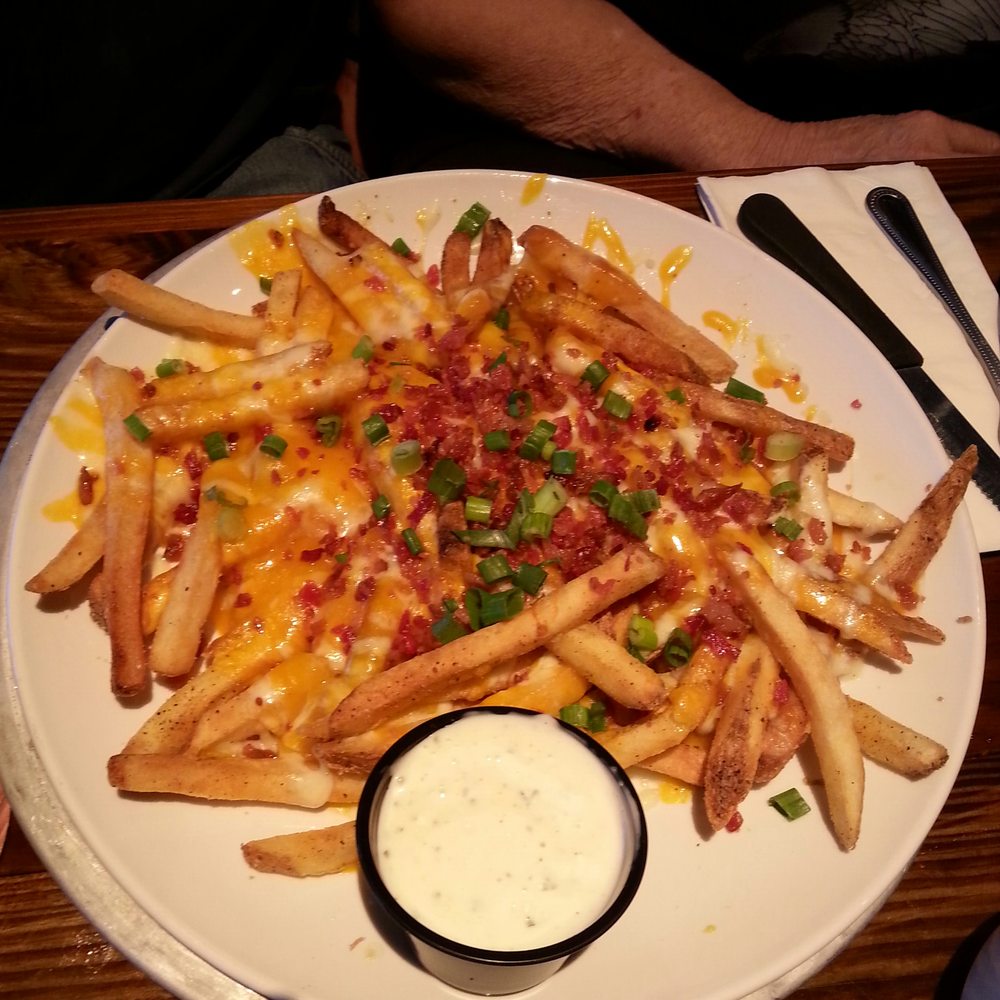 Miller's Ale House - Ale house loaded fries - Sports Bars Near Me - Seminole, Florida Miller's Ale House - Ale house loaded fries - Sports Bars Near Me - Seminole, Florida