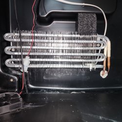 Denver Appliance Wizard - Replacing an evaporator that leaked and caused the U-Line beverage cooler to not cool.