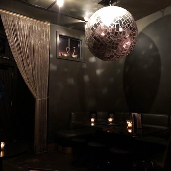 Foreign National - Cool disco ball and chain curtains - Cocktail Bars Near Me - Seattle, Washington