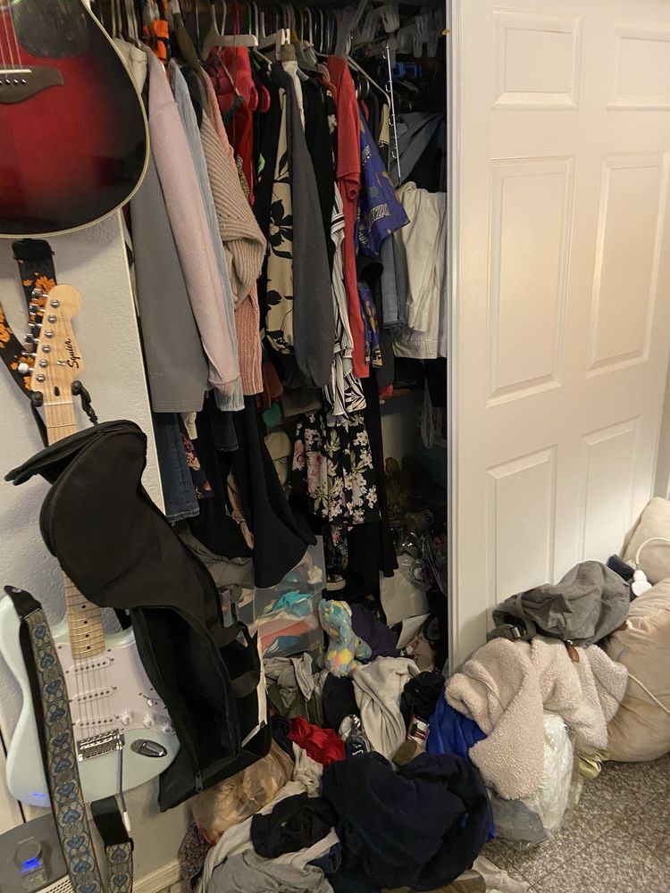 Cluttered closet before organizing by Molly