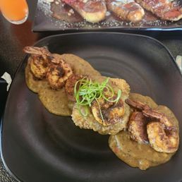 Blackened shrimp and grits. Strawberry and cream French toast Blackened shrimp and grits. Strawberry and cream French toast