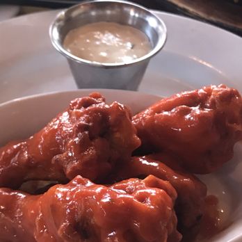 Tahoe Joe's - 4 Buffalo Wings happy hour $3.75 - Steakhouses Near Me - Visalia, California Tahoe Joe's - 4 Buffalo Wings happy hour $3.75 - Steakhouses Near Me - Visalia, California