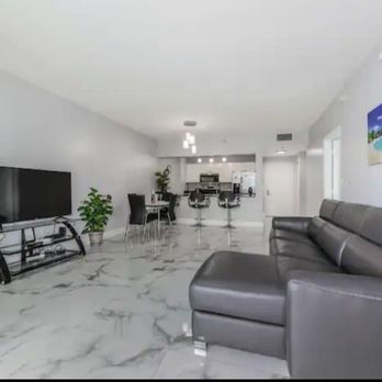 Flooring Kingdom - a living room and dining area - Flooring Near Me - Hialeah, Florida Flooring Kingdom - a living room and dining area - Flooring Near Me - Hialeah, Florida