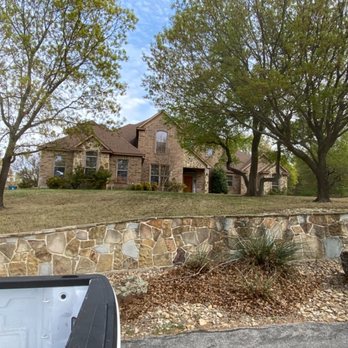 ZipLawn - a house in the background with trees in the foreground - Lawn Services Near Me - Granbury, Texas ZipLawn - a house in the background with trees in the foreground - Lawn Services Near Me - Granbury, Texas