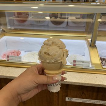 Kilwins Ice Cream - Chocolate - Fudge - a hand holding a cone of ice cream - Ice Cream & Frozen Yogurt Near Me - Charleston, South Carolina Kilwins Ice Cream - Chocolate - Fudge - a hand holding a cone of ice cream - Ice Cream & Frozen Yogurt Near Me - Charleston, South Carolina