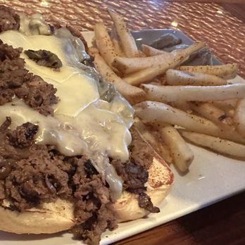 Miller's Ale House - PHILLY CHEESESTEAK W/FRIES - Sports Bars Near Me - Palm Coast, Florida Miller's Ale House - PHILLY CHEESESTEAK W/FRIES - Sports Bars Near Me - Palm Coast, Florida