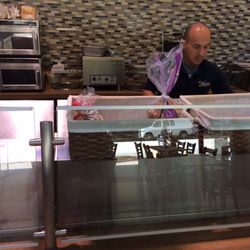 Murphy's Deli - My man whipping up something good. I got an egg and cheese on a croissant and it was the bomb.