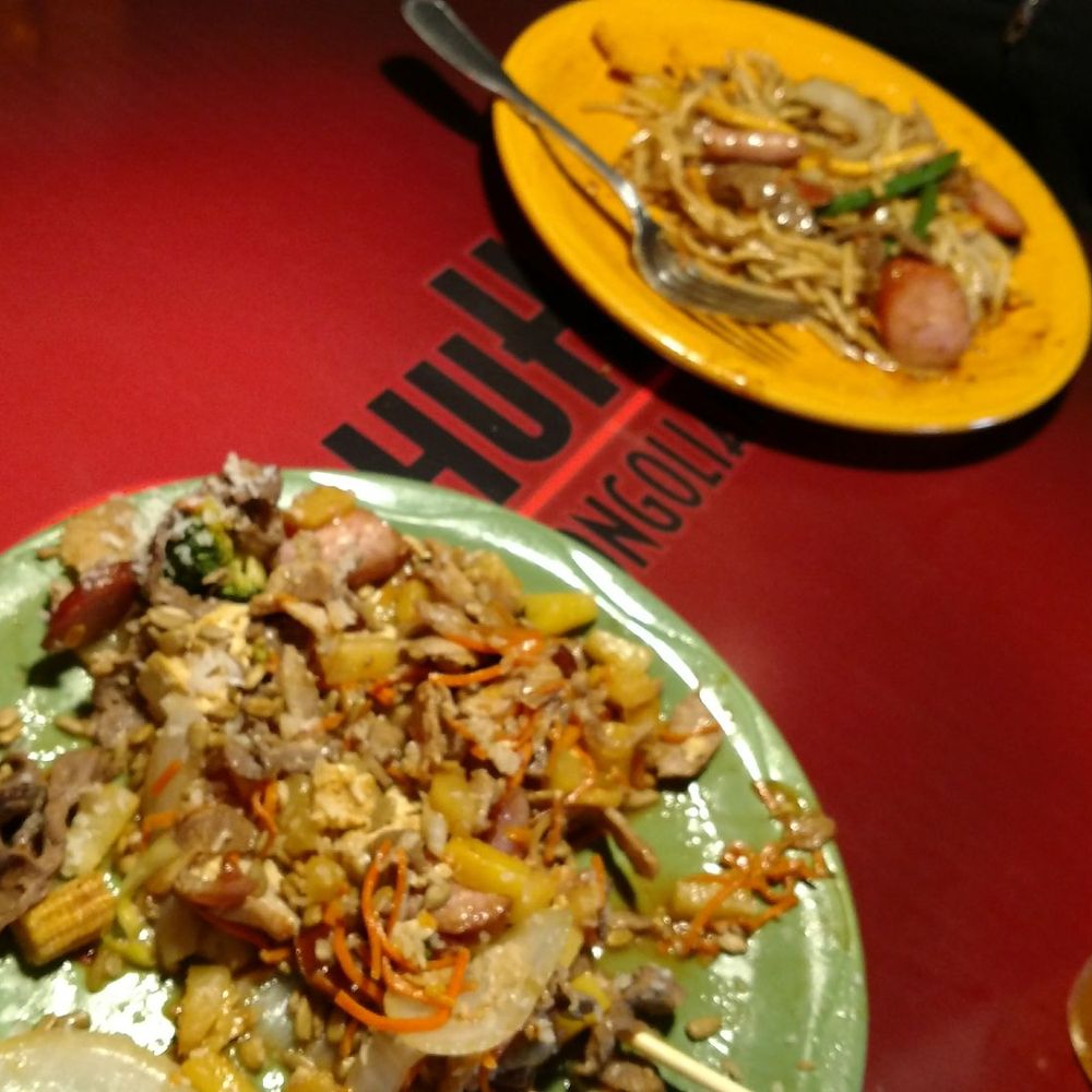 HuHot Mongolian Grill - two plates of food on a red table - Chinese Near Me - Sioux Falls, South Dakota