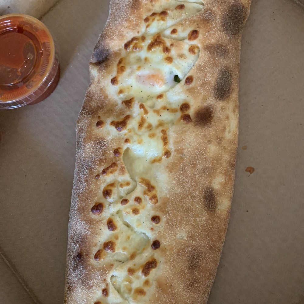 Northender Italian Kitchen - Calzone with shrimp and broccoli - Pizza Near Me - Arlington, Massachusetts Northender Italian Kitchen - Calzone with shrimp and broccoli - Pizza Near Me - Arlington, Massachusetts