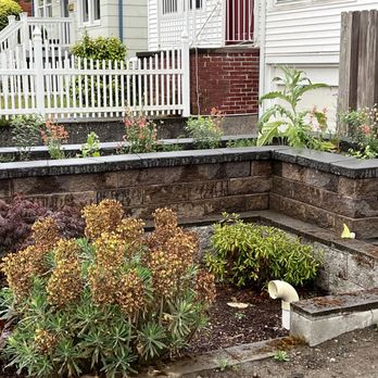 GrassLand- Synthetic Turf - Raised planter bed designed to fit around an existing rain runoff area. - Landscaping Near Me GrassLand- Synthetic Turf - Raised planter bed designed to fit around an existing rain runoff area. - Landscaping Near Me