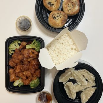 Bao Gogo - The spread... looked good and was good (except for the feathery chicken). Very well packaged for takeout purposes. - Dim Sum Near Me - Atlanta, Georgia