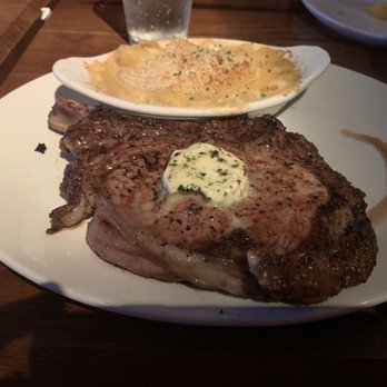 Stoney River - Cowboy steak with baked Gouda macaroni and cheese - Steakhouses Near Me - Atlanta, Georgia Stoney River - Cowboy steak with baked Gouda macaroni and cheese - Steakhouses Near Me - Atlanta, Georgia