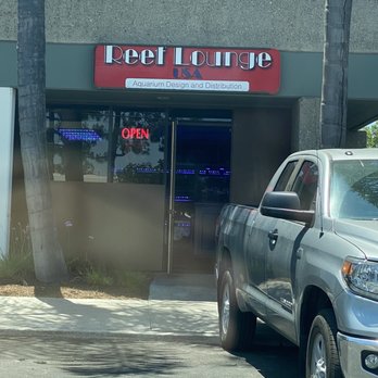 Reef Lounge USA - They said they're closed open sign on and door wide open. - Aquarium Services Near Me - Anaheim, California