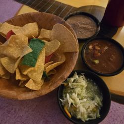 El Pueblito Mexican Restaurant - Chips served with frijolitos, salsa, and I dont know what that other stuff was. It was kinda like curtido.