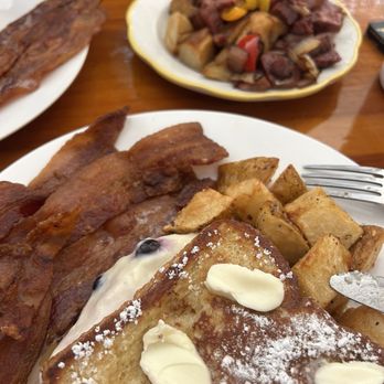 Waves - Blueberry stuffed French toast with crispy bacon and a side of corn beef hash. - American Near Me - Boothbay Harbor, Maine