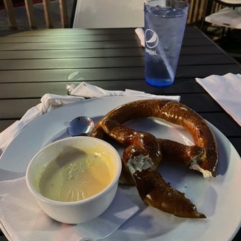 McMae's Tavern & Grill - Perfect pretzel with side of cheese sauce.  Amazing.  Id this cheese is in their nachos as well it would be amazing - American Near Me - Bartlett, Illinois
