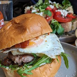Papercup Coffee Company - Burger breakfast sandwich (sausage egg and halloumi)