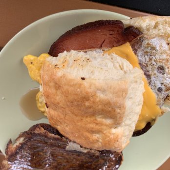 Sunrise Memphis - The "P-Love" biscuit with fried bologna and a slice of banana bread French toast. - Breakfast & Brunch Near Me - Memphis, Tennessee Sunrise Memphis - The "P-Love" biscuit with fried bologna and a slice of banana bread French toast. - Breakfast & Brunch Near Me - Memphis, Tennessee