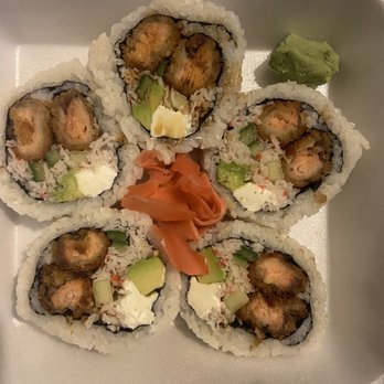 Tokyo Express - Golden Salmon roll/ as a Daisy flower I had already put soy sauce on a roll about to devour..had to get a photo - Japanese Near Me - Modesto, California Tokyo Express - Golden Salmon roll/ as a Daisy flower I had already put soy sauce on a roll about to devour..had to get a photo - Japanese Near Me - Modesto, California