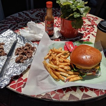 Calypso Cafe - A burger patty for the pups and a tasty burger with fries for me and a cappuccino for me. - Breakfast & Brunch Near Me - Coronado, California Calypso Cafe - A burger patty for the pups and a tasty burger with fries for me and a cappuccino for me. - Breakfast & Brunch Near Me - Coronado, California