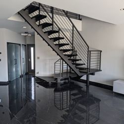 Acadia Stairs - Modern Single Stringer stair with metal treads and line rails
