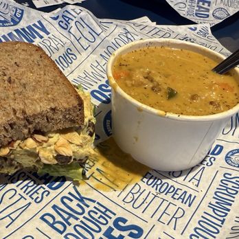 Beyond Bread - My Kalid's kurry on multigrain bread and a cup of coconut curry (small). - Bakeries Near Me - Tucson, Arizona