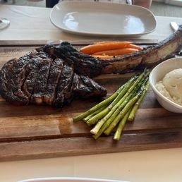 Tomahawk steak and sides Tomahawk steak and sides