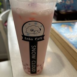 Strawberry Milk Tea with strawberry popping bubbles Strawberry Milk Tea with strawberry popping bubbles