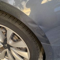 Dent Wize - Paintless dent removal tesla quarter panel before