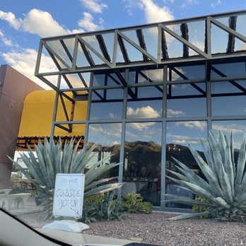 Trattoria Pina - the reflection of a building in the windows - Italian Near Me - Tucson, Arizona